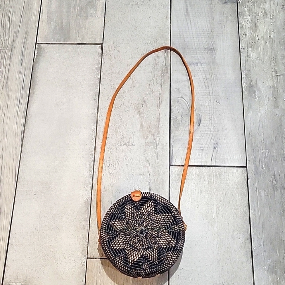 Street Level basket weaving and leather straps purse